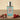 Imagine Citrus eau de parfum by Avenue Perfumes with pale blue juice, styled on a warm beige backdrop — long-lasting citrus fragrance, our impression of Louis Vuitton Imagination
